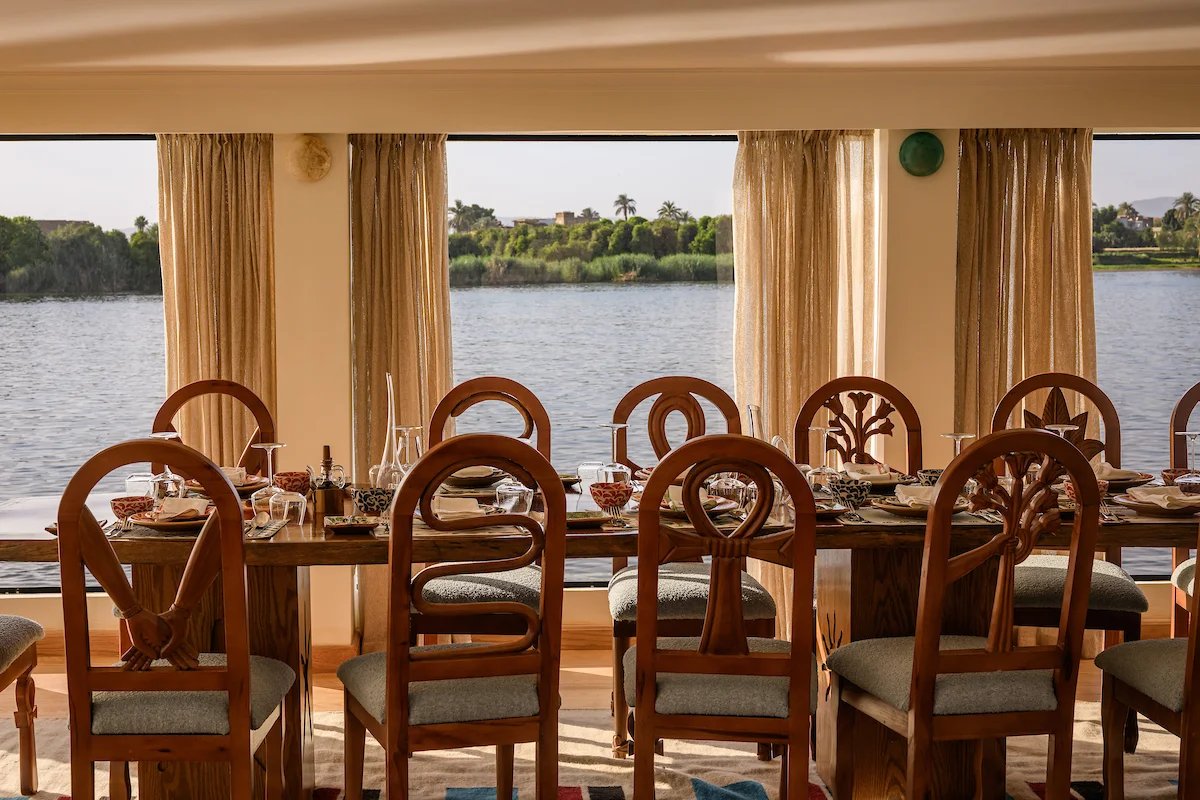 The oak dining table aboard Nile Divine dahabiya