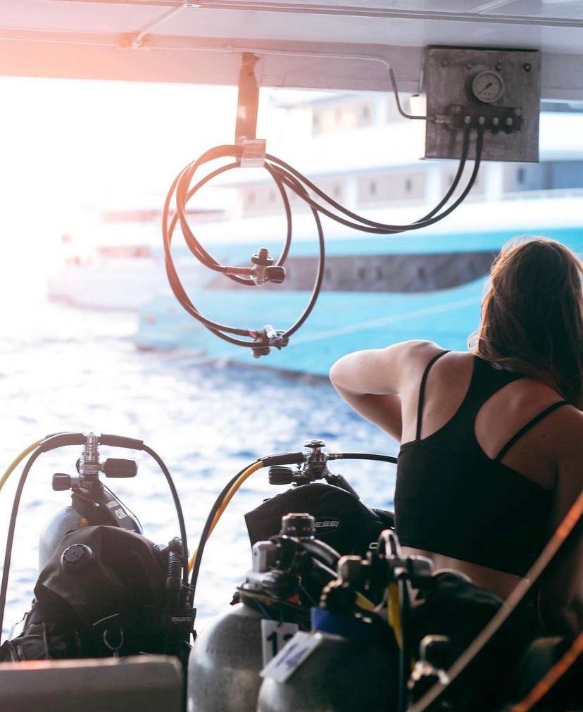 Gearing up to dive on deck