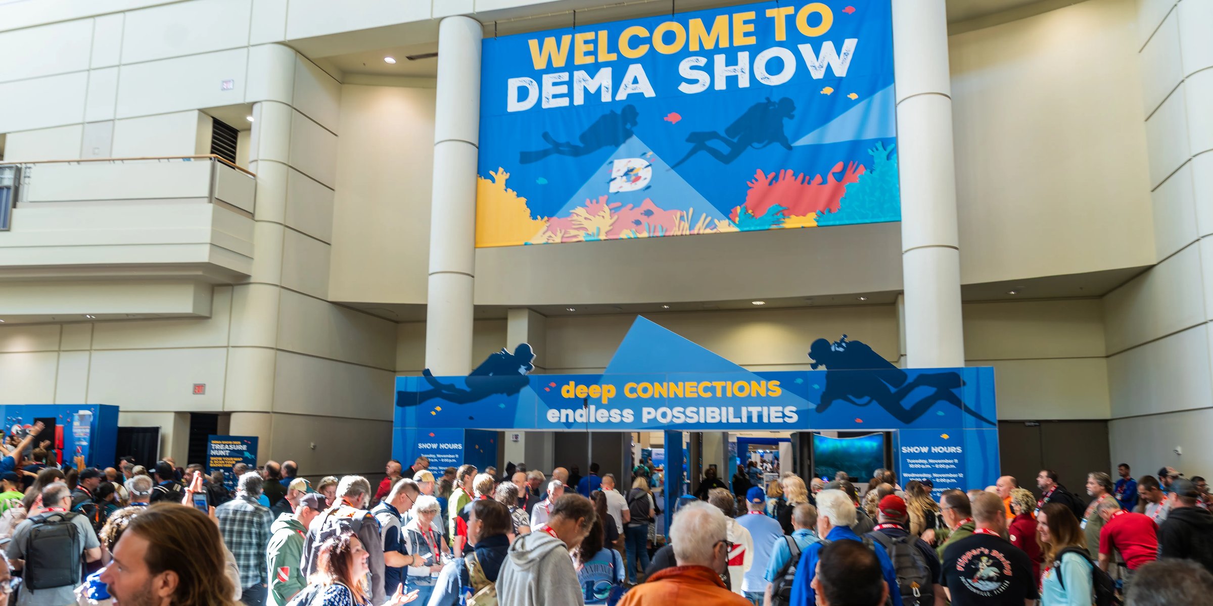 Welcome to DEMA Show entrance and crowd, dive industry trade show