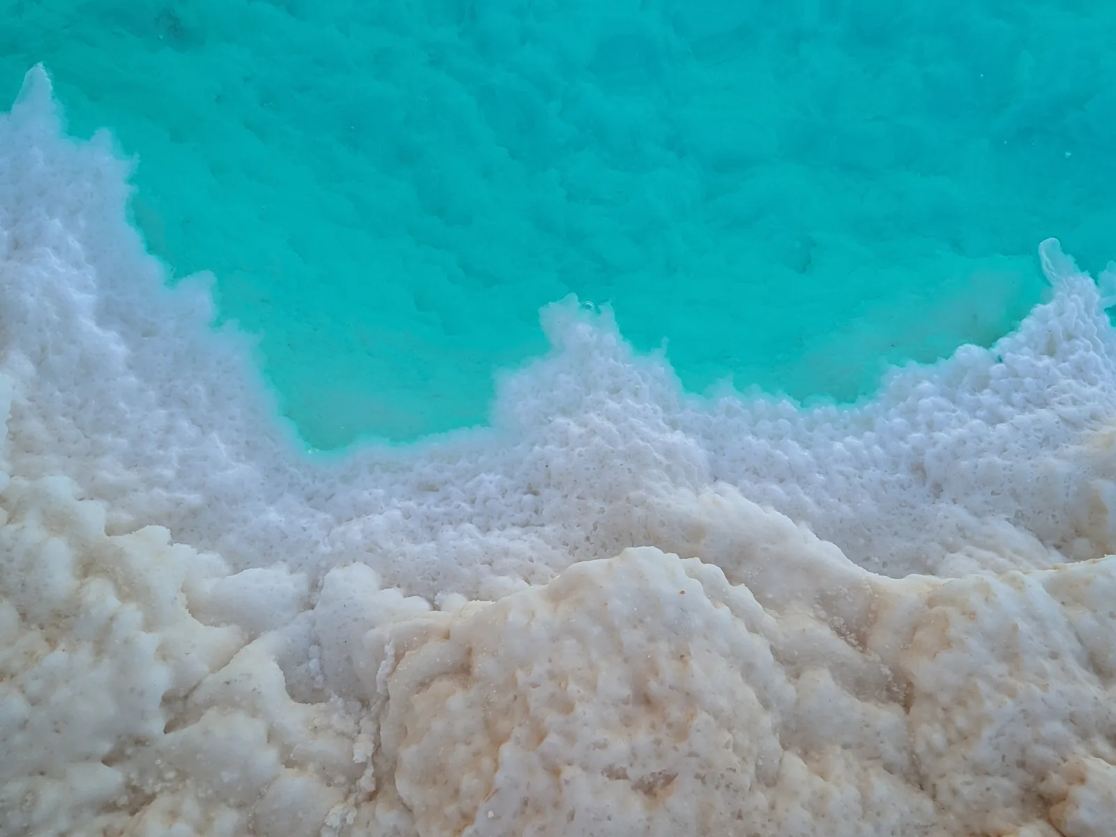 A turquoise salt lake at Siwa