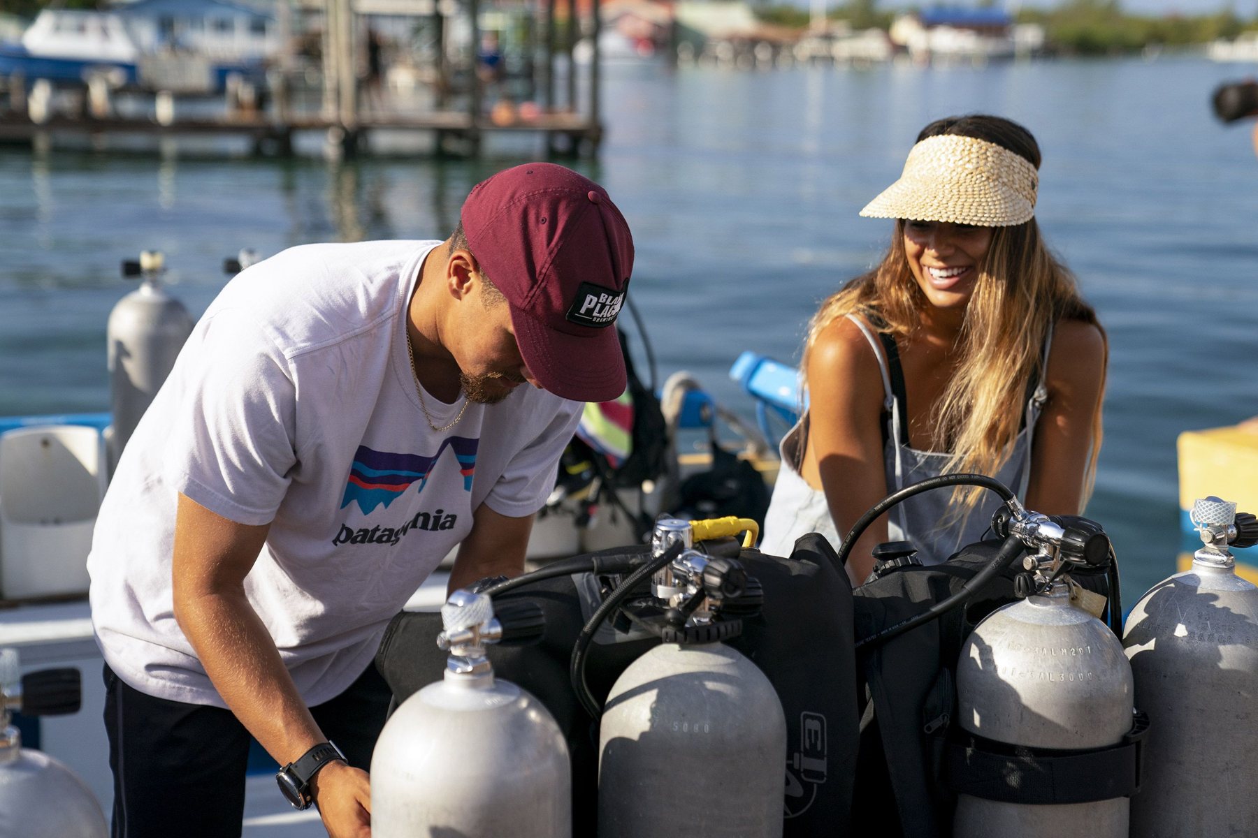 A couple on the deck of a liveaboard