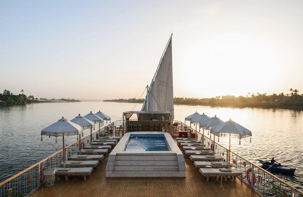A Nile dahabiya on the Nile at sunset